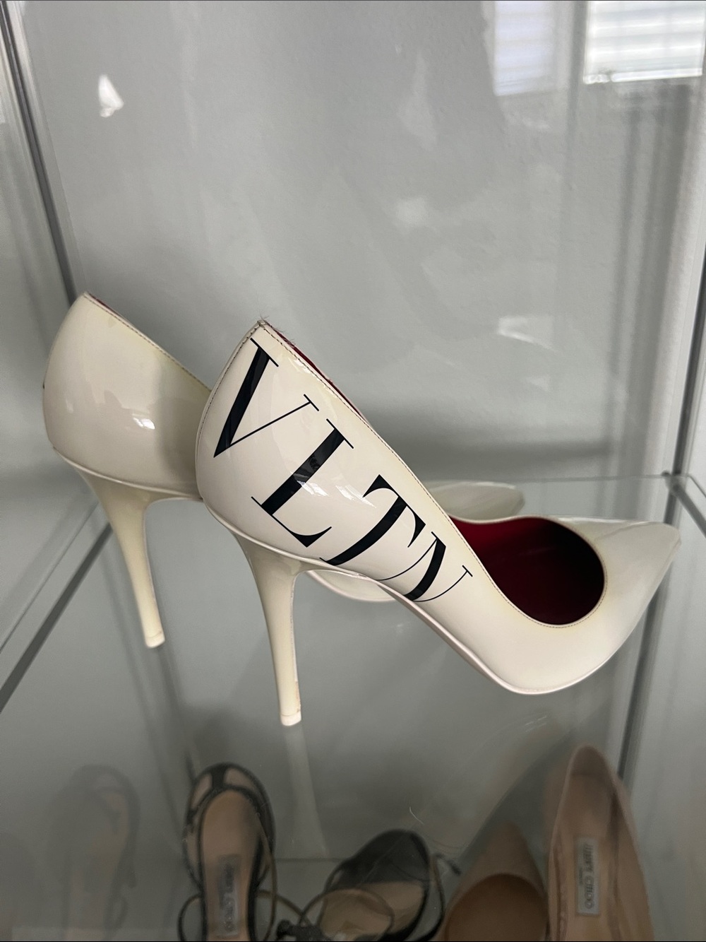 Valentino White Patent VLTN Pointed Stiletto Pumps with Red Interior